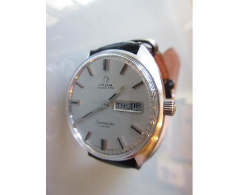 Gentleman's Omega Seamaster Cosmic stainless steel wristwatch with calendar aperture on a black leather strap