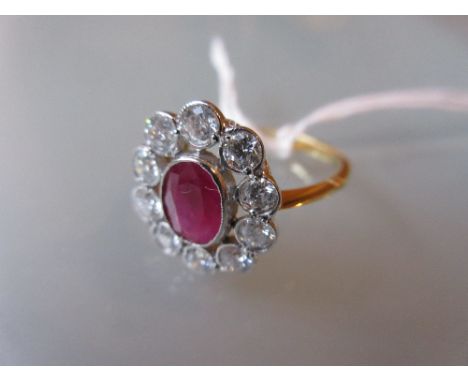 18ct Yellow gold oval, ruby and diamond cluster ring