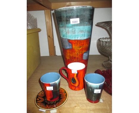 Five items of Poole Pottery including a 14in gemstone pattern vase