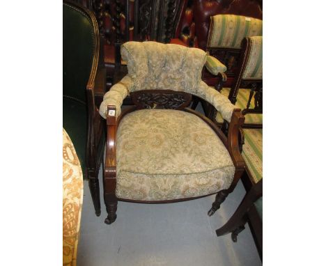 19th Century tub shaped drawing room chair having floral button upholstery and carved decoration on turned supports with cast