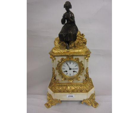 19th Century French white marble, ormolu and dark patinated bronze mounted mantel clock, surmounted by a seated figure of a l