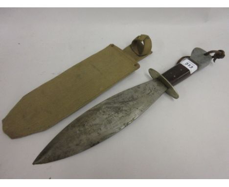 World War II period Far Eastern military dagger with a hardwood and metal grip in a webbing covered scabbard