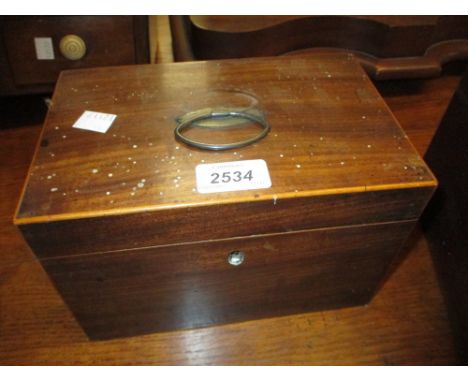 Small George III mahogany and boxwood line inlaid rectangular tea caddy with a two division interior