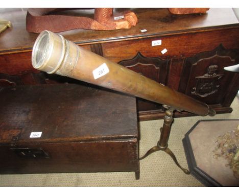 Small Victorian brass telescope on a folding tripod base