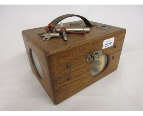 Oak cased pigeon timer clock
