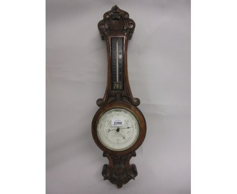 Small carved oak cased aneroid barometer thermometer by Wood of Liverpool and Manchester