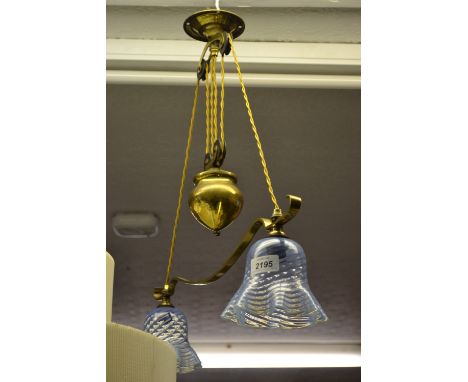Brass rise and fall light fitting with Vaseline shades, an Art Deco metal table lamp and an early 20th Century hanging light 