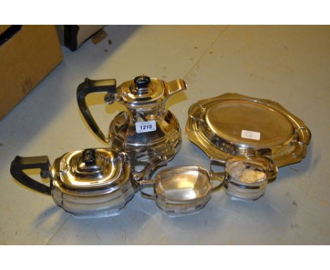 Silver plated four piece tea service and a plated entree dish