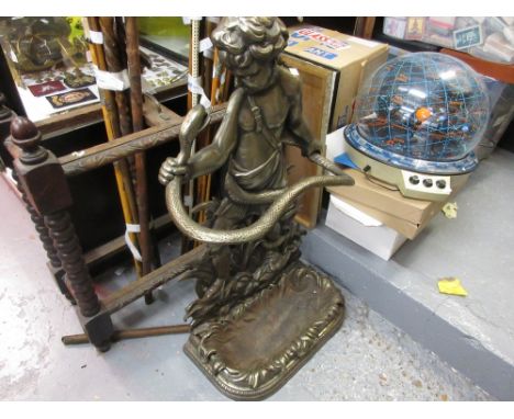19th Century cast iron stick stand in the form of putto wrestling a python