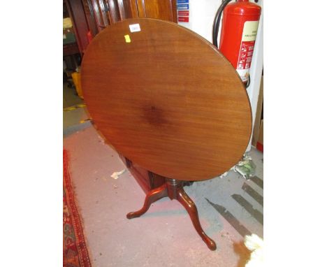 George III mahogany circular tilt top pedestal table with tripod base