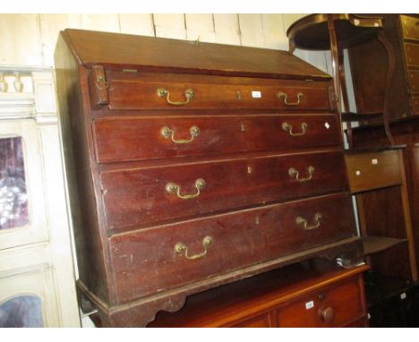 George III oak bureau with a fall front above four graduated drawers, with brass swan neck handles on bracket supports