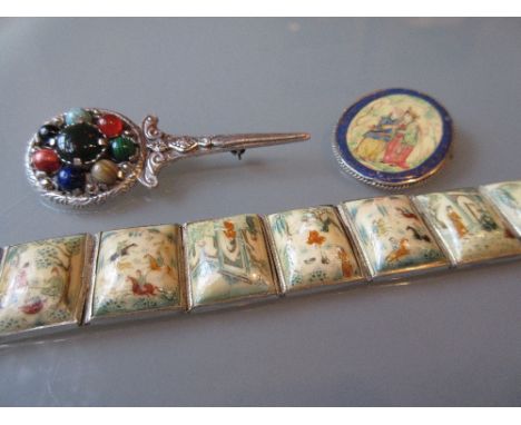 Persian white metal and painted bone bracelet, similar oval brooch and a Celtic design brooch