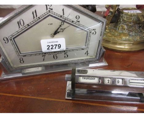 Art Deco chrome cased eight day mantel clock with silvered dial and Arabic numerals and a chrome desk calendar