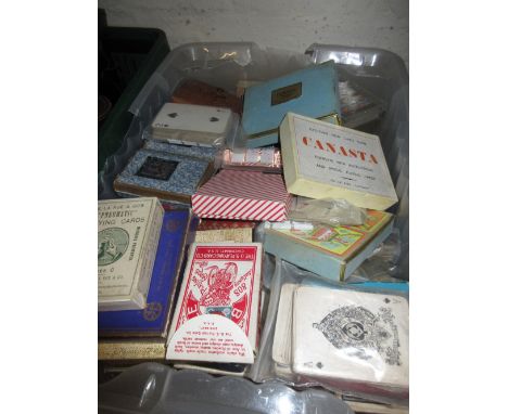 Box containing a quantity of various European sets of playing cards
