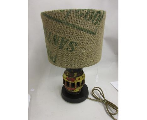 Lamp base made from a 19th Century cart wheel boss with original rustic finish and hessian covered shade