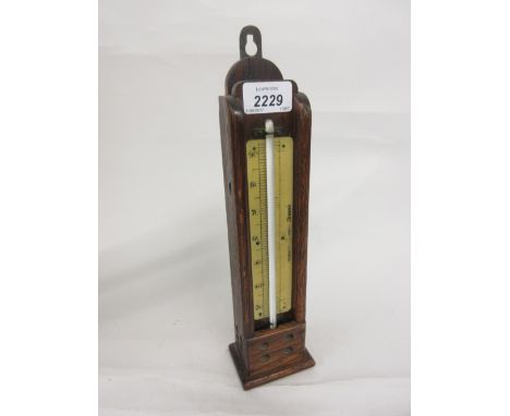 Oak cased thermometer by Negretti and Zambra, London