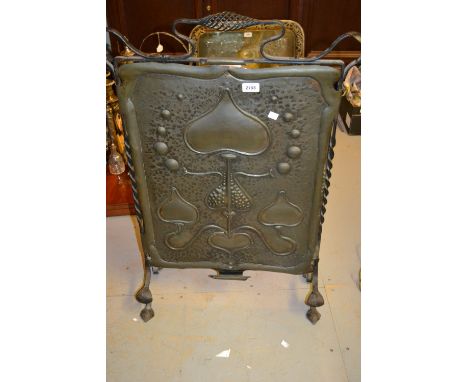 Art Nouveau embossed copper and wrought iron firescreen
