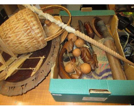 Box containing a collection of mainly mid 20th Century tribal carvings etc including walking stick, bowl, basket etc