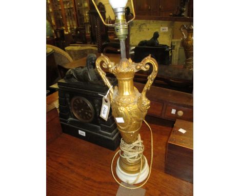 Gilded composition table lamp in the form of a two handled pedestal vase together with a small gilt framed wall mirror