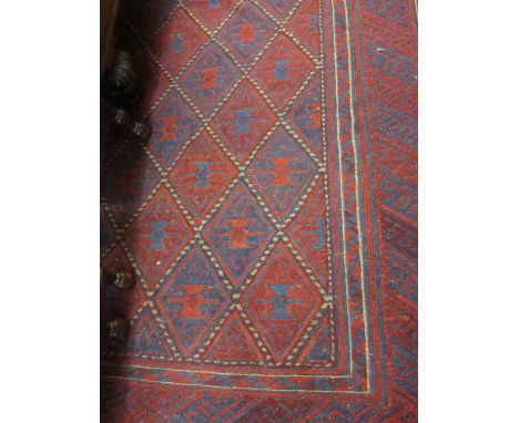 20th Century Belouch style rug with part flat weave geometric design in shades of wine red and blue, 7ft x 4ft 6ins approxima