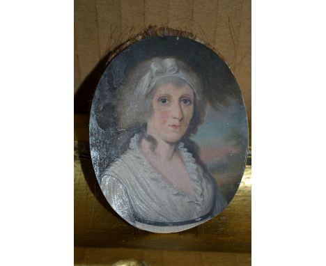 19th Century portrait miniature of a lady in a gilt metal frame
