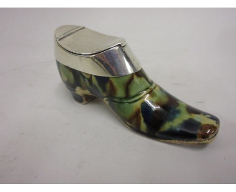 Tortoiseshell glazed pottery snuff box in the form of a shoe with plated mounts