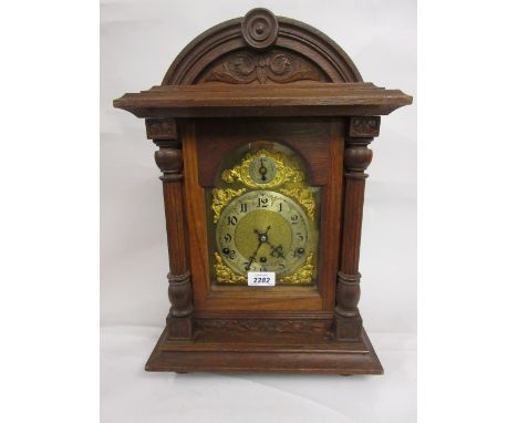 19th Century German oak cased bracket clock, the gilt dial with a silvered chapter ring and Arabic numerals, strike / silent 