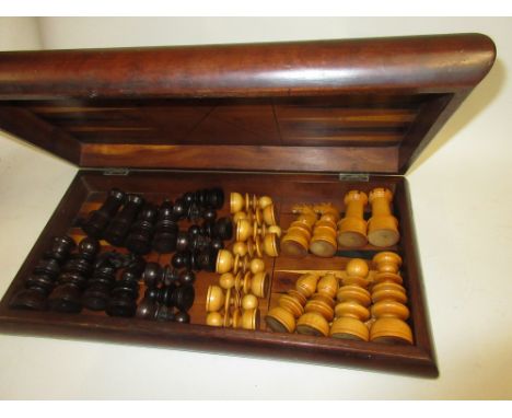 20th Century boxwood and rosewood chess set in a folding yew wood veneered and inlaid box, inlaid for chess and backgammon