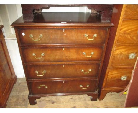 Mid 20th Century mahogany straight front chest of four graduated drawers with brass swan neck handles and bracket feet, 31ins