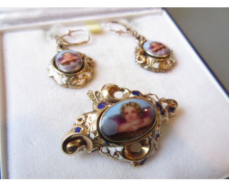 19th Century Continental gold enamel decorated brooch with matching ear drops, each inset with oval porcelain plaques painted