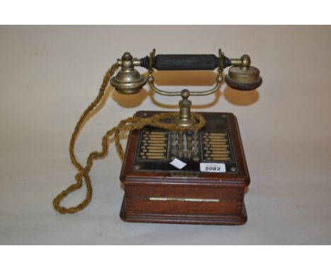 Mid 20th Century mahogany cased and metal mounted push button telephone by L.M. Ericsson, Manufacturing Company Limited