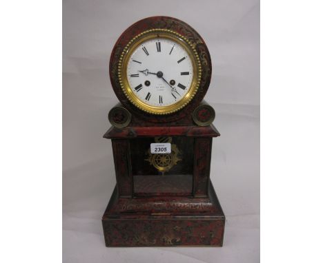 19th Century French buhl and ebonised mantel clock, the red stained tortoiseshell and cut brass front with brass mounts, the 