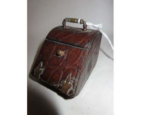 Late 19th or early 20th Century alligator leather covered inkwell in the form of a miniature coal purdonium
