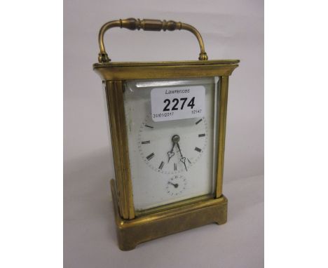 Moser of Paris, 19th Century gilt brass carriage clock, the enamel dial with Roman and Arabic numerals and subsidiary alarm d