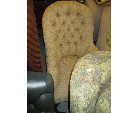 Victorian floral button upholstered tub shaped chair on turned front supports with brass and ceramic casters