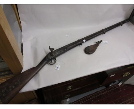 19th Century percussion musket (a/f) together with a leather powder flask