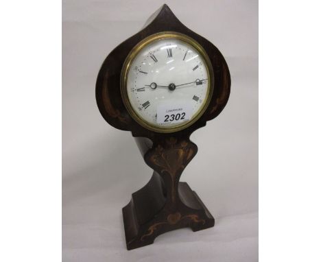 Edwardian mahogany and marquetry inlaid mantel clock of stylised Art Nouveau form, the enamel dial with Arabic and Roman nume