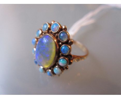 14ct Yellow gold oval opal cluster ring