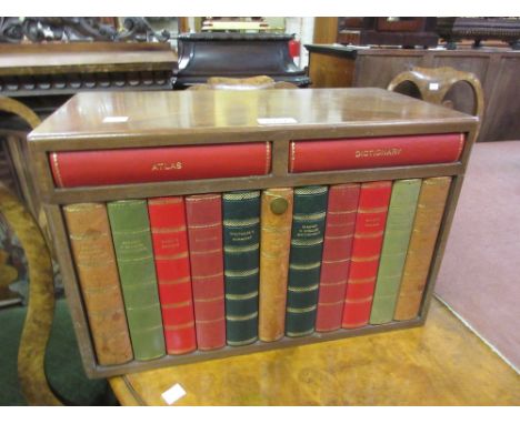 Mid 20th Century walnut decanter box in the form of a small shelf of books housing three cut glass decanters and six glass tu