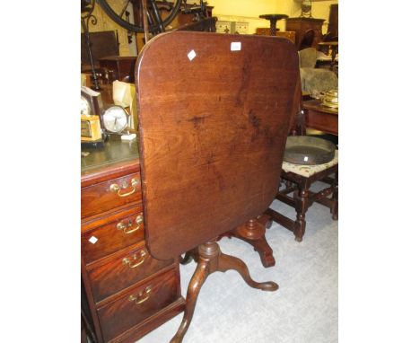 George III mahogany rectangular tilt top pedestal table with a bird cage and baluster column support above a tripod (a/f)