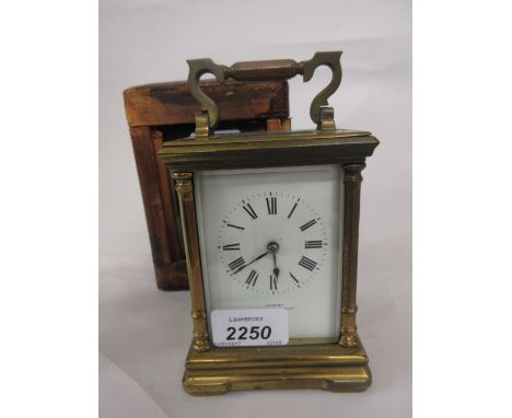 Early 20th Century brass cased carriage clock, the enamel dial with Roman numerals inscribed ' Examined by Mappin and Webb Lt