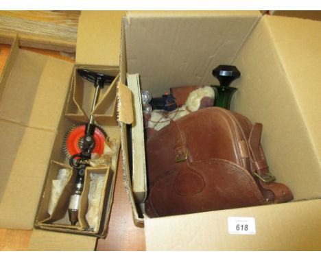 Box containing a miscellaneous quantity of items including: leather gun cartridge case, battery operated toy dog, green glass