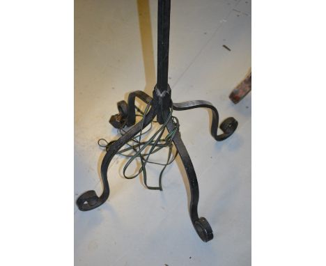 Black wrought iron standard lamp with shade