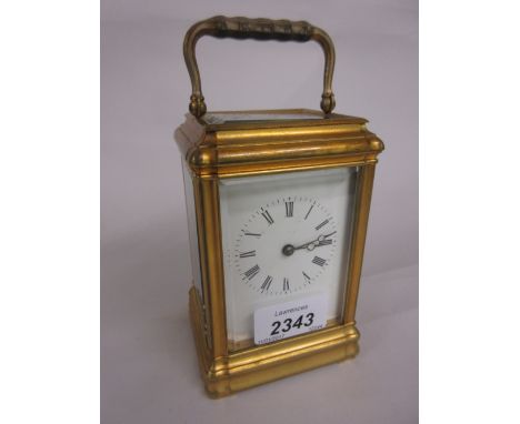 Good quality late 19th or early 20th Century gilt brass carriage clock, the Gorge case enclosing an enamel dial with Roman nu
