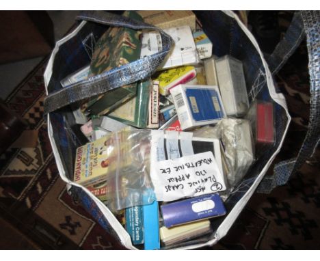 Bag containing a similar quantity of advertising and assorted playing cards