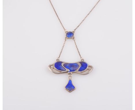 AN ARTS AND CRAFTS SILVER AND ENAMEL PENDANT BY CHARLES HORNER, the stylised oval shaped mount with pierced details set throu