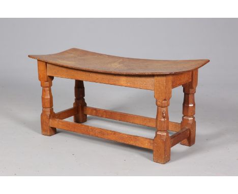 ROBERT THOMPSON OF KILBURNA MOUSEMAN OAK DOUBLE DISH TOP STOOL, with adzed top and faceted baluster legs continuing to blocks