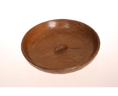 ROBERT THOMPSON OF KILBURNA MOUSEMAN OAK 12-INCH FRUIT BOWL, circular, adzed throughout and with carved mouse signature. 30cm