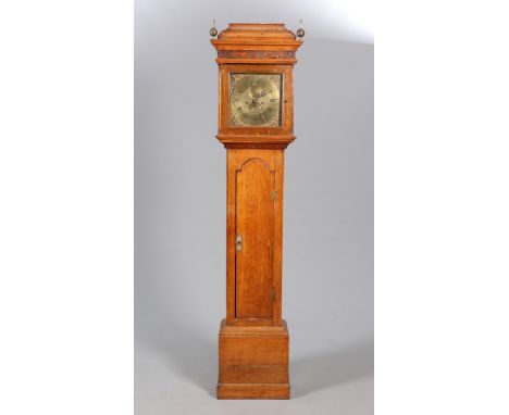 AN 18TH CENTURY OAK EIGHT-DAY LONGCASE CLOCK, the hood with caddy top, the case with long trunk door and plinth base, the 11-