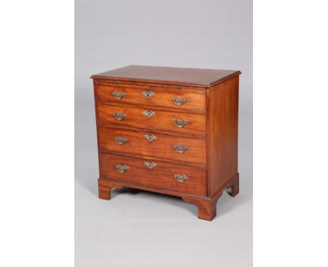 A GEORGE III MAHOGANY CHEST OF DRAWERS, the moulded rectangular top above a slide over four long graduated drawers with brass